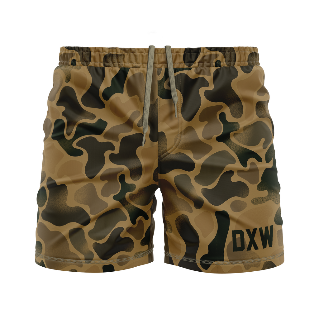 Camouflage shorts with 'DXW' branding on a white background