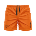 Base Collection men's FC shorts, orange/black